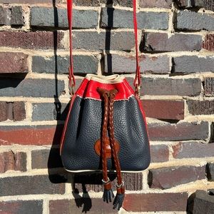 Vintage Dooney and Bourke Teton Mini Drawstring crossbody in Red, Bone, Navy